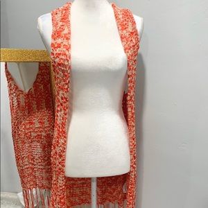 Beautiful orange with beige knitted vest with fringe. Never used 
Size M